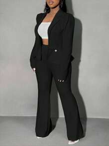 SHEIN SXY Traje de blazer de manga larga con cuello de solapa y pantalones campana de unicolor para mujer de talla grande