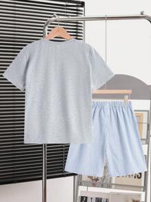 SHEIN Set da 2 pezzi per ragazzo adolescente, composto da maglietta a maniche corte con scollo tondo e pantaloncini a righe, in stile casual estivo, pigiama allentato