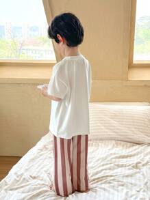 SHEIN Young Boys Casual 2 Pieces Set - Minimalist Star & Moon Graphic Short Sleeve Top & Plaid Wide Leg Pants, Loungewear - White - View 2