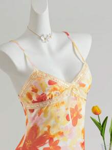 Sweetina Váy mini xếp lớp nơ bèo nhún in hoa - trái cam - Xem 5