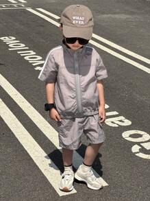 SHEIN 2pcs Set Young Boy Summer Casual Outdoor Fashion Contrast Strap Decor Back English Print Comfortable Soft Fabric Zip Up Short Sleeve Jacket + Elastic Waist Patchwork Pocket Decorated Casual Shorts Outfit, Suitable For Outgoing, Outdoor, Shopping, Party Etc. - Grey - View 3