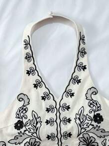 SHEIN Leap Crew Teen Girls 2 Pieces Floral Embroidered Halter Neck Crop Top And A-Line Mini Skirt Set, Vacation Outfit - Apricot Base With Black Flower Embroidery, Suitable For Beach, Holiday, Party, Music Festival - Apricot - View 8