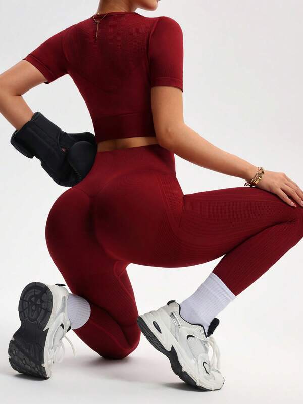 SHEIN Sport Studio Ensemble sport élastique sans couture avec Top court et legging de couleur unie