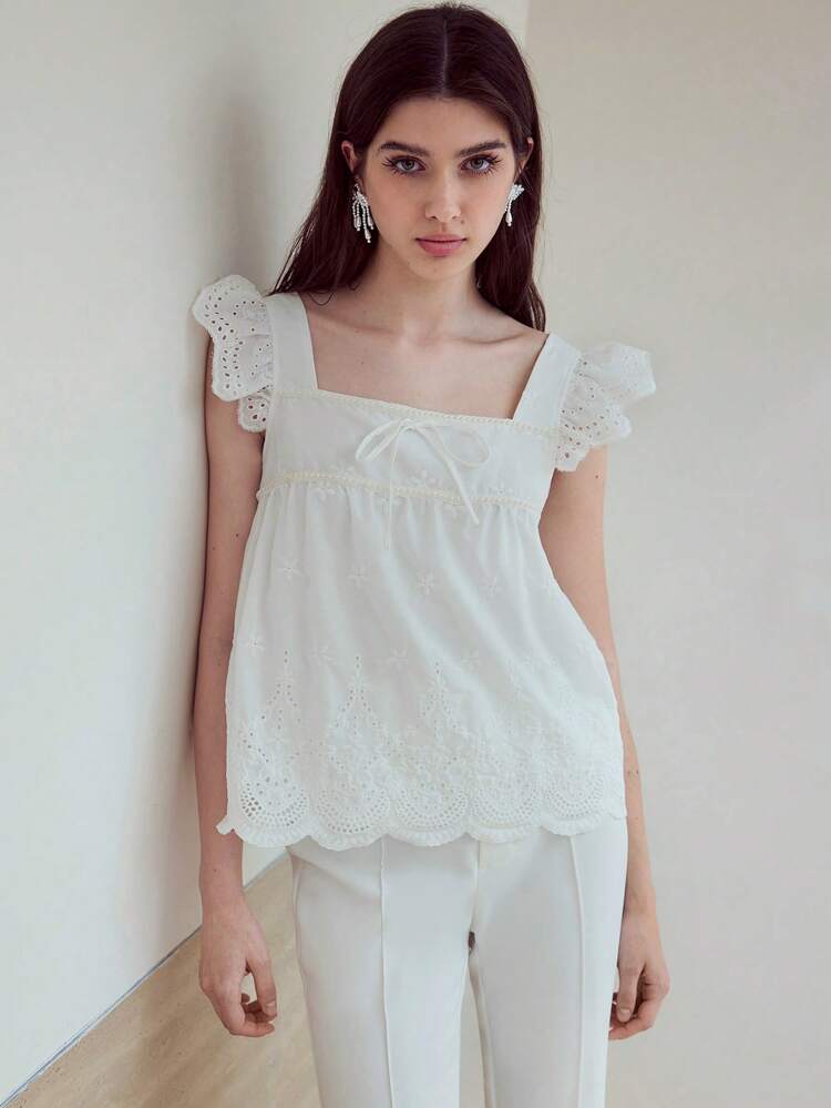 MOTF STUDIO BLUSA BORDADA COM ILHÓS E BABADO