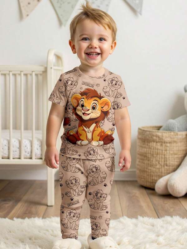 SHEIN Pijama de niño con top de manga corta y cuello redondo y pantalones, ajuste cómodo, estilo casual, apto para todas las estaciones