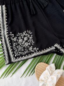 Flirla Pantaloncini neri retrò con ricamo e fiocco