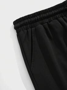 SHEIN Pantalones de chándal sólidos cómodos y casuales para adolescentes varones - Negro - Ver 6