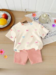 SHEIN Baby Mädchen Lässiges minimalistisches Set aus Rundhals Kurzarm T-Shirt und engen Shorts, geeignet für Frühling und Sommer