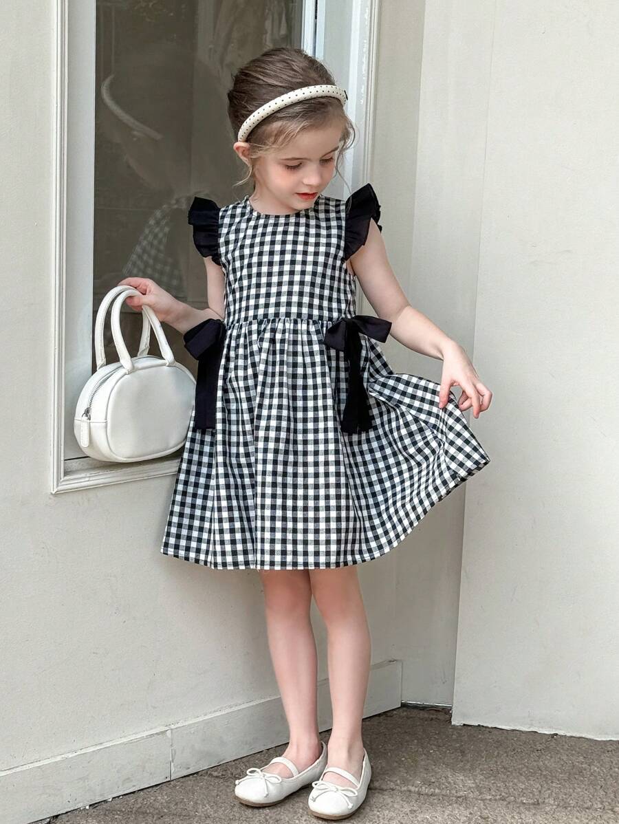 SHEIN LMoss Kids Young Girl Woven Plaid Round Neck Ruffle Bow Casual Dress, Suitable For Outdoor, Party & Other Occasions - Black and White - View 1