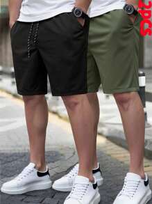 Manfinity Homme 2 piezas Pantalones cortos casuales de moda para hombres con cintura elástica