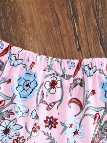 Tenue pour bébé fille, Top à col rond avec imprimé fleuri et franges, assorti à un short. Tenue polyvalente et décontractée, adaptée pour le port quotidien.