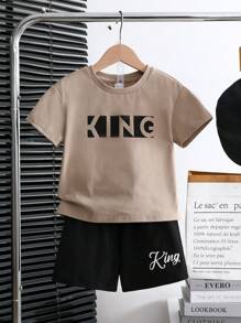 Young Boy 2 Pieces Set Minimalist Letter Graphic Crew Neck Short Sleeve Tee And Shorts Knit Pajamas, Casual & Comfy