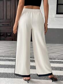 Pariaura Pantalones de pierna acampanada de cintura alta para mujer, de estilo francés a dos tonos, con tela drapeada y decoración de rayas laterales, pantalones blancos para primavera y verano