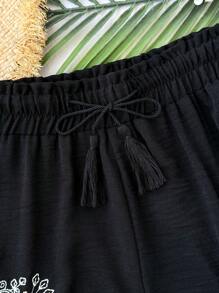 Flirla Pantaloncini neri retrò con ricamo e fiocco