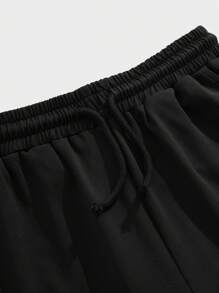SHEIN Pantalones de chándal sólidos cómodos y casuales para adolescentes varones - Negro - Ver 5