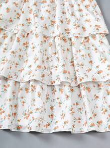 Vestido de niña preadolescente con múltiples capas de volantes y estampado floral, falda de tipo pastel, ideal para fiestas y salidas con estilo campestre en todas las estaciones