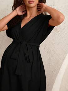 MaterniWear Elegant Black Maternity Midi Dress: V-Neck, Short Sleeve, Wrap Style, Flared Hem, Woven Fabric - Black - View 5