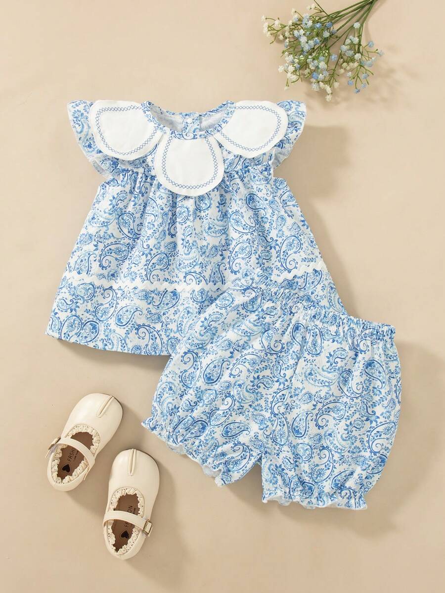 SHEIN Young Girl' Summer New Simple Blue & White Porcelain Color Vintage Floral Print Wave Trim Ruffle Collar Loose Blouse & Floral Embroidery Hem Shorts Casual Sweet Vintage Coordinating Set - Blue - View 1