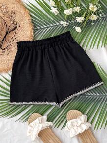 Flirla Pantaloncini neri retrò con ricamo e fiocco