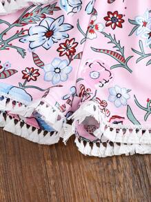 Tenue pour bébé fille, Top à col rond avec imprimé fleuri et franges, assorti à un short. Tenue polyvalente et décontractée, adaptée pour le port quotidien.