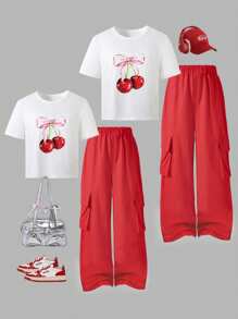Conjunto de 2 piezas para niñas pre-adolescentes con blusa de cuello redondo de manga corta con estampado de cerezas y pantalones cargo en rojo y blanco