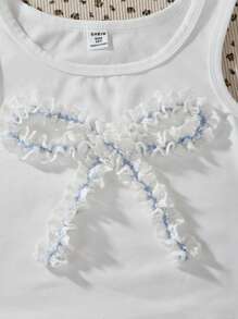 SHEIN Elladie kids Áo hai dây mảnh trang trí nơ ren 3D dễ thương và ngọt ngào cho bé gái tuổi mới lớn, phù hợp để mặc hàng ngày, đi làm, thường ngày, đi nghỉ, tụ họp chị em, xuân/hè - trắng - Xem 4