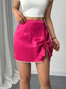 Chiquease Falda mini acampanada de cintura alta con decoración de perlas, borlas en forma de corazón y moño, ajuste ceñido, nueva para el verano - Rosa Fucsia - Ver 6