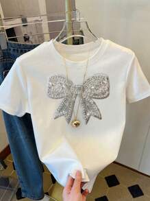 SHEIN LUNE Plus Size Women Summer Casual Bow Print Round Neck Short Sleeve T-Shirt
