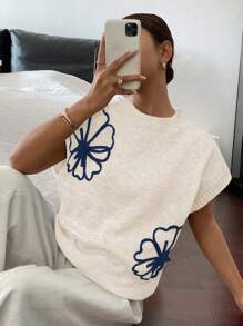 Serisse Women's Casual Knit Top: Apricot Rib-Knit Sweater With Cap Sleeves And Round Neckline Featuring Delicate Floral Embroidery Detail
