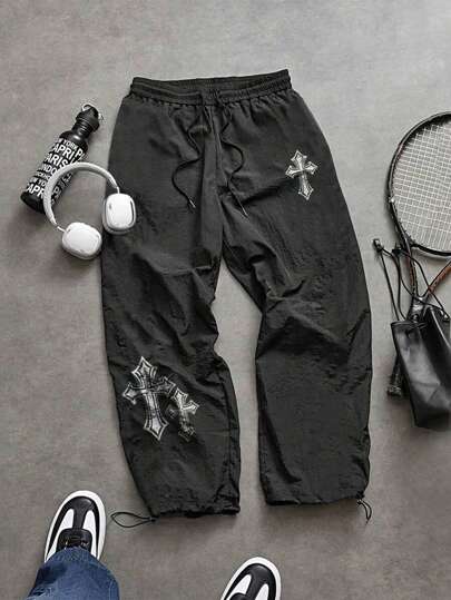 Manfinity Sport Corelite Pantalones deportivos casuales para hombres, simples y de moda, adecuados para el verano, diseño de patrón cómodo y transpirable, holgados para el gimnasio, pantalones de chándal