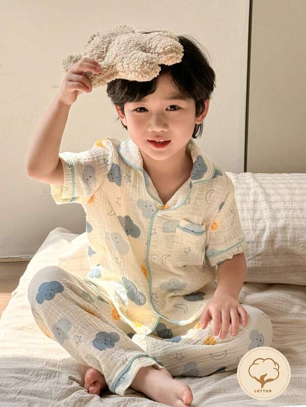 SHEIN Genkimix Kids 2pcs/Set Young Boy Apricot Crinkled Cotton Short Sleeve Top And Pants Pajama Set With Whimsical Sun, Star, Cloud Pattern, Comfortable & Close-Fitting, Summer Boys Clothes Cotton Boy Clothes 8 Boy Clothes For Kids Young Boys Sets Boy Clothes 7 Boy Clothes 10