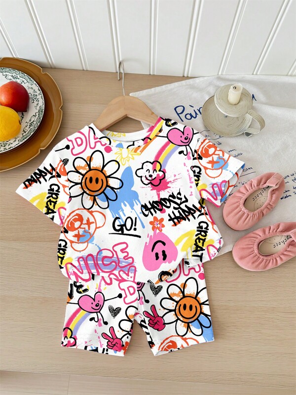 SHEIN Baby Girl Cute Doodle, Face & Floral Print Casual Round Neck Short Sleeve T-Shirt & Shorts Set, Suitable For Spring & Summer