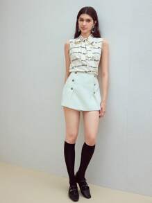 MOTF STUDIO TOP Z GRAFICZNYMI LITERAMI I WIĄZANYM SZYJĄ - Czarne i Białe - Zobacz 3