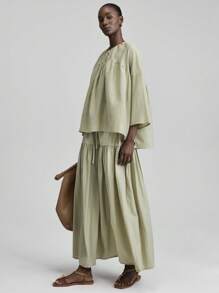 Ontre 绿色 2025 春夏纯色前短后长休闲度假衬衫，长袖上衣，鼠尾草绿色假日海滩派对节日派对上衣，多功能通勤，音乐节服装 - 綠色 - 查看 4