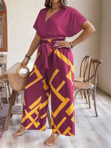 SHEIN LUNE Conjunto de 2 piezas de talla grande casual de vacaciones con camisa de manga murciélago de unicolor y pantalones anchos de pierna con estampado de contraste