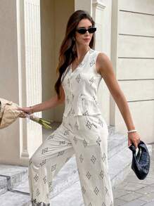 SHEIN Frenchy Conjunto informal de 2 piezas de estampado integral compuesto por top sin mangas y pantalones para vacaciones y estilo bohemio, atuendo de verano y para la playa para mujer