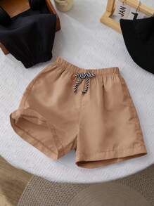 SHEIN Conjunto de 2 peças de shorts casuais confortáveis e modernos, práticos e fofos, macios e respiráveis para meninos, adequados para férias, uso diário, escola, viagens, esportes, primavera e verão, roupa de banho para meninos, sunga para meninos, roupa de banho para meninos, sunga para meninos, verão