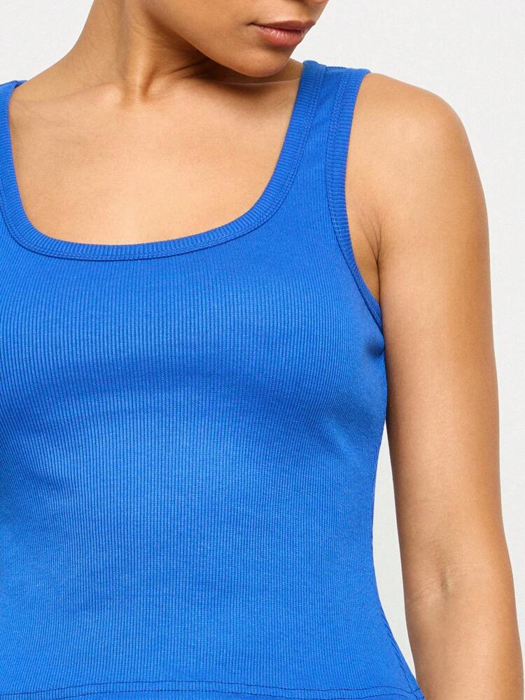 Top in costina basic con scollo a barca