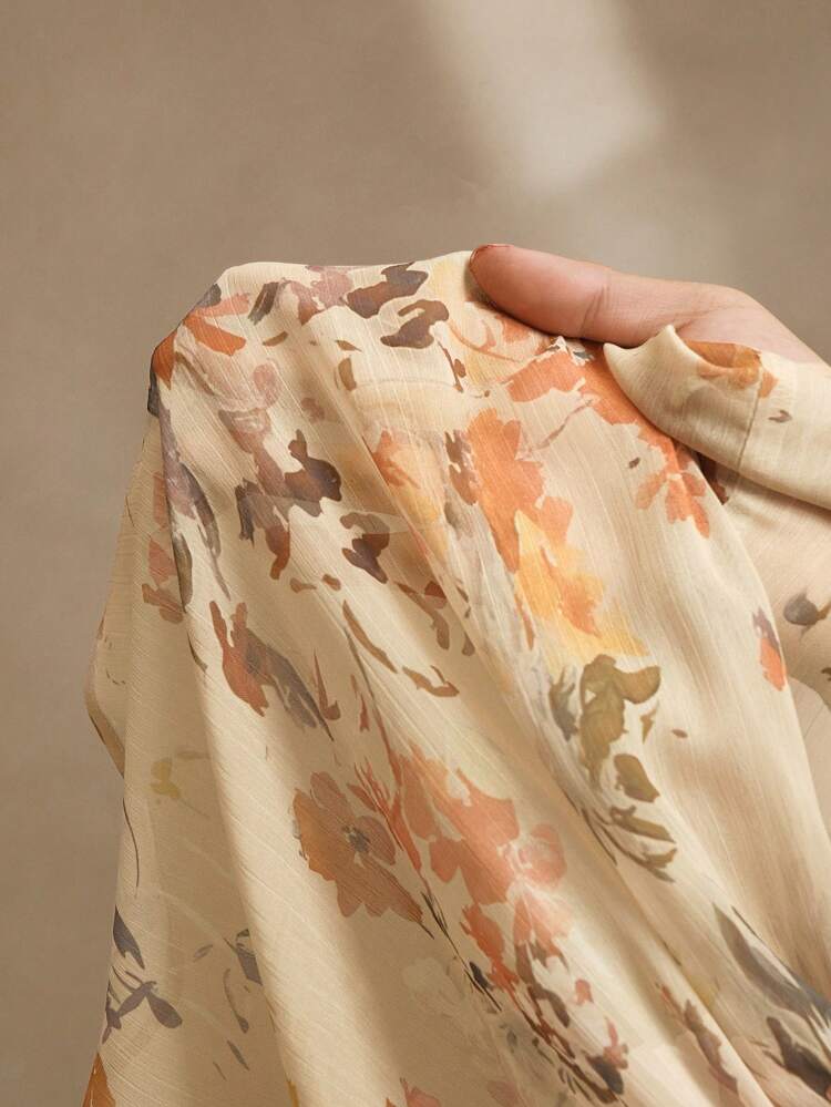 French Elegant Apricot Ditsy Floral Bow Lantern Sleeve Waist Flattering Ruffled Hem Mini Dress