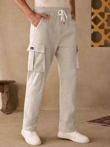 Manfinity ModaGents Pantaloni cargo da uomo casual, a vita media, con coulisse e tasche multiple, taglio affusolato