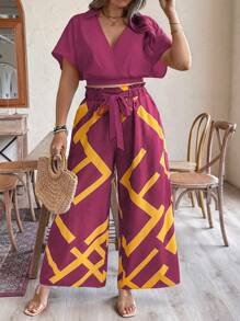 SHEIN LUNE Conjunto de 2 piezas de talla grande casual de vacaciones con camisa de manga murciélago de unicolor y pantalones anchos de pierna con estampado de contraste