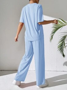 Mulvari Women's Casual Two-Piece Outfit: Knitted Fabric, Short Sleeve Round Neck Top And Long Patched Pants In Sky Blue - Blue - View 6