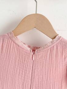 SHEIN Vestido casual suelto de unicolor, cuello redondo y sin mangas para niñas jóvenes