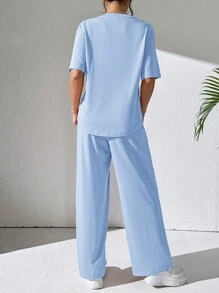 Mulvari Women's Casual Two-Piece Outfit: Knitted Fabric, Short Sleeve Round Neck Top And Long Patched Pants In Sky Blue - Blue - View 2