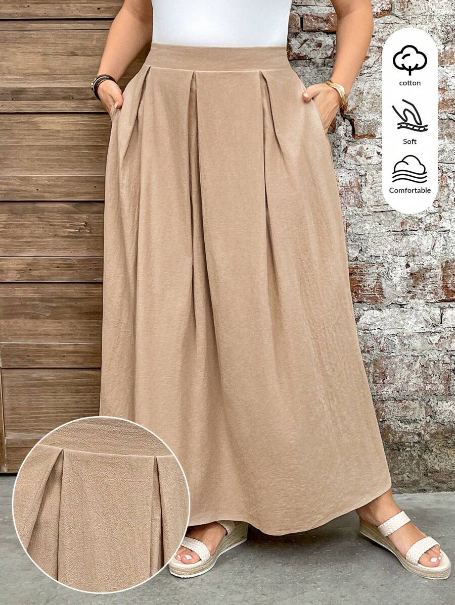SHEIN LUNE تنورة بوهيمية بجيوب مطوية وشق، متعددة الاستخدامات بلون أحادي، مناسبة للمناسبات الكاجوال مثل عيد الفصح والحفلات الريفية والتخرج والصيف والغداء في عيد الأم والكنيسة، مقاسات كبيرة - لون مشمشي - مشاهدة 1