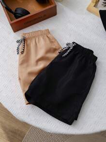 SHEIN Conjunto de 2 peças de shorts casuais confortáveis e modernos, práticos e fofos, macios e respiráveis para meninos, adequados para férias, uso diário, escola, viagens, esportes, primavera e verão, roupa de banho para meninos, sunga para meninos, roupa de banho para meninos, sunga para meninos, verão