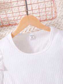 Conjunto de camiseta de manga corta y falda pantalón con perlas de unicolor para niña preadolescente