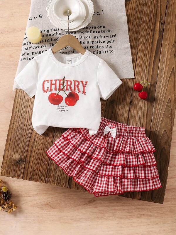 SHEIN LMoss Kids LMoss   2pcs Young Girl Cherry Print Knit T-Shirt And Woven Plaid Skirt Set