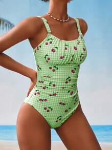SHEIN Traje de baño de una pieza con estampado de cuadros y cerezas, adecuado para la playa y las vacaciones para mujeres
