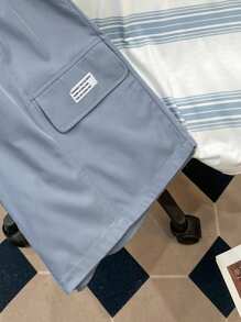 SHEIN 2 sztuki/zestaw Swobodny kostium dla nastolatków dla chłopców Ubrania dla nastolatków Ulica Sportowy Styl przygotowawczy Paski Kolor Blok Krótki Rękaw T-shirt i khaki Cargo Shorts Set - Brudny niebieski - Zobacz 7